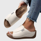 Light brown classic walking sandals with a cushioned sole, designed for comfort and casual wear. 0