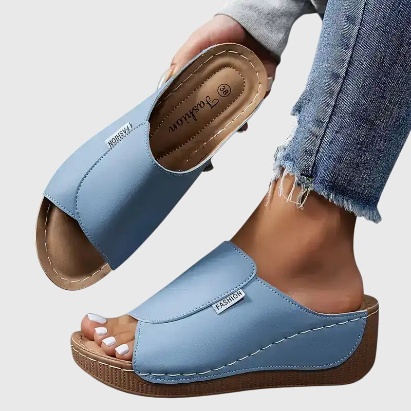 Light brown classic walking sandals with a cushioned sole, designed for comfort and casual wear. 2