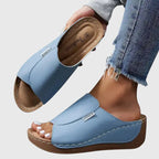 Light brown classic walking sandals with a cushioned sole, designed for comfort and casual wear. 2