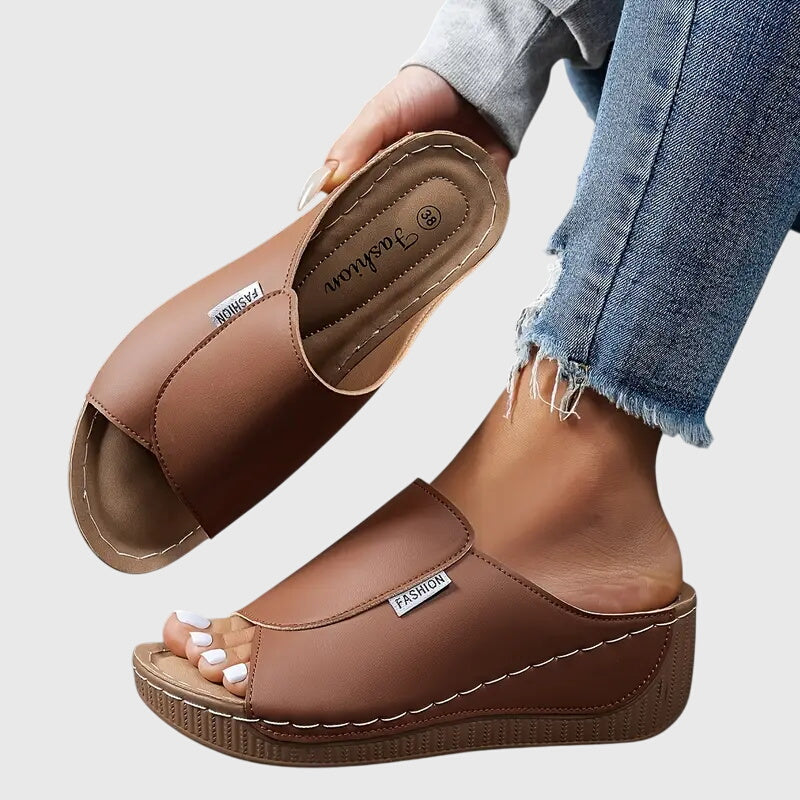 Light brown classic walking sandals with a cushioned sole, designed for comfort and casual wear. 3