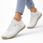 Olivia orthopedic sneakers in navy blue, featuring a comfortable, cushioned design for everyday wear. 1