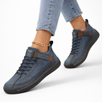 Olivia orthopedic sneakers in navy blue, featuring a comfortable, cushioned design for everyday wear. 4