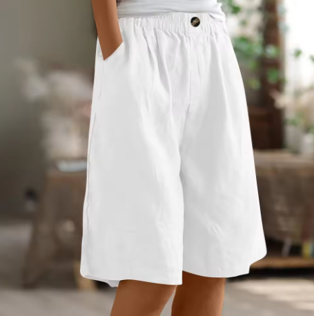 Soft beige women's shorts in a relaxed fit, perfect for casual summer outings. 12