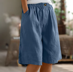 Soft beige women's shorts in a relaxed fit, perfect for casual summer outings. 3