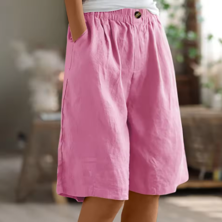Soft beige women's shorts in a relaxed fit, perfect for casual summer outings. 4