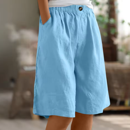 Soft beige women's shorts in a relaxed fit, perfect for casual summer outings. 6