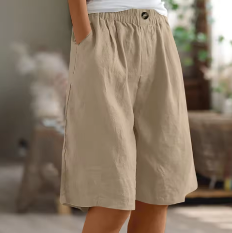 Soft beige women's shorts in a relaxed fit, perfect for casual summer outings. 7
