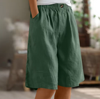 Soft beige women's shorts in a relaxed fit, perfect for casual summer outings. 8