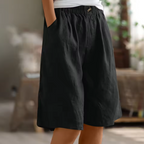 Soft beige women's shorts in a relaxed fit, perfect for casual summer outings. 9