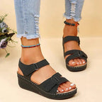 Lightweight brown walking sandals with a casual style, featuring adjustable straps for comfort. 0