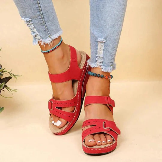 Lightweight brown walking sandals with a casual style, featuring adjustable straps for comfort. 2
