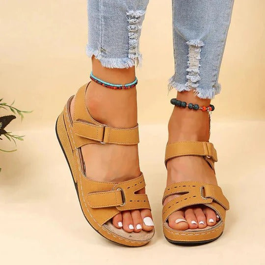 Lightweight brown walking sandals with a casual style, featuring adjustable straps for comfort. 5