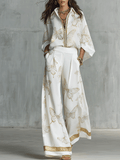 Bohemian-style blouse and wide-leg pants set in butterfly jacquard, featuring a soft cream color. 0
