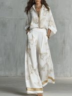 Bohemian-style blouse and wide-leg pants set in butterfly jacquard, featuring a soft cream color. 0