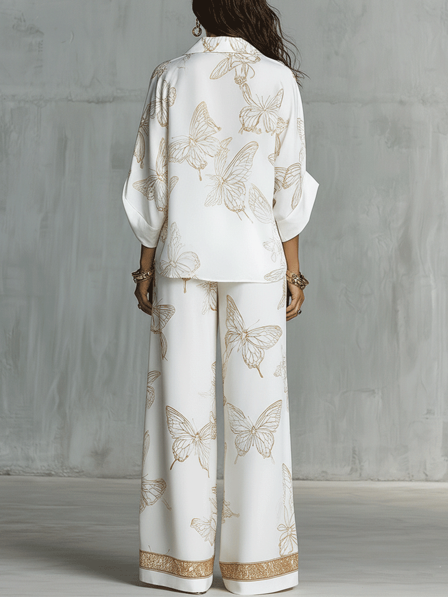 Bohemian-style blouse and wide-leg pants set in butterfly jacquard, featuring a soft cream color. 4