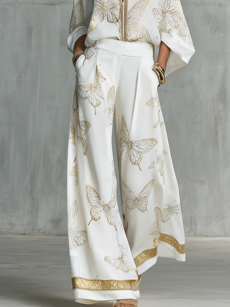 Bohemian-style blouse and wide-leg pants set in butterfly jacquard, featuring a soft cream color. 6
