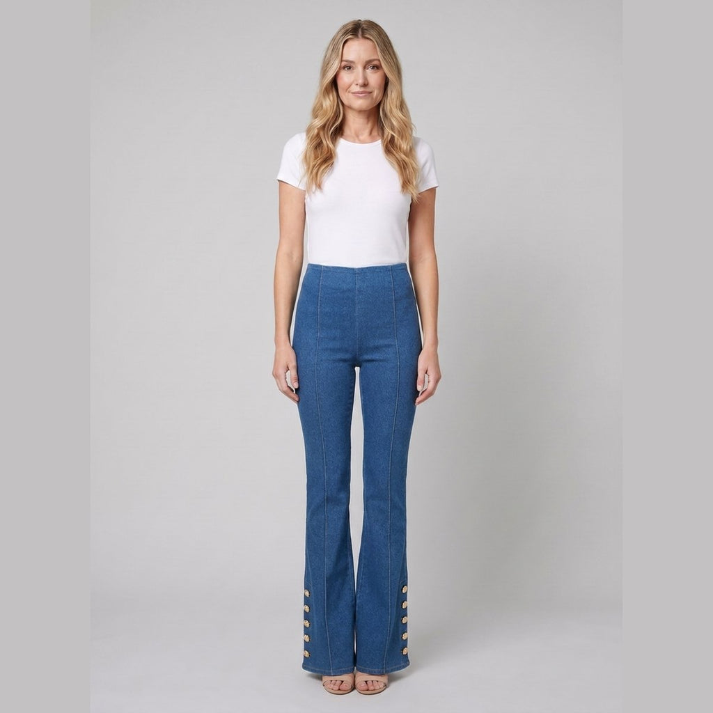 Kendra mid-wash denim flared pants with gold buttons, front