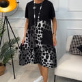Lisette - Loose printed dress with round neck and short sleeves