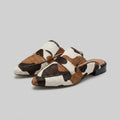 Alina brown and white cow-print loafers
