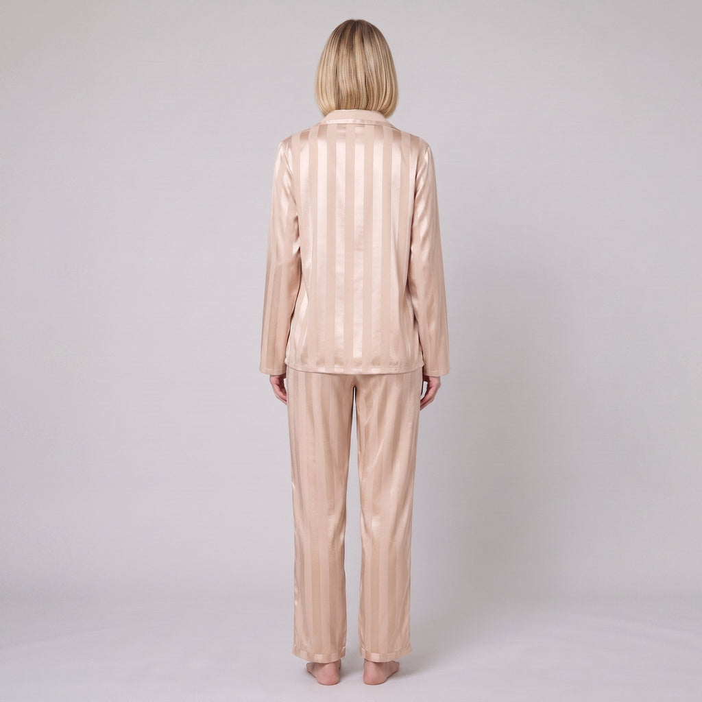 Luxe satin pyjama set in champagne beige, back view on model