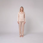 Luxe satin pyjama set in champagne beige, front view on model