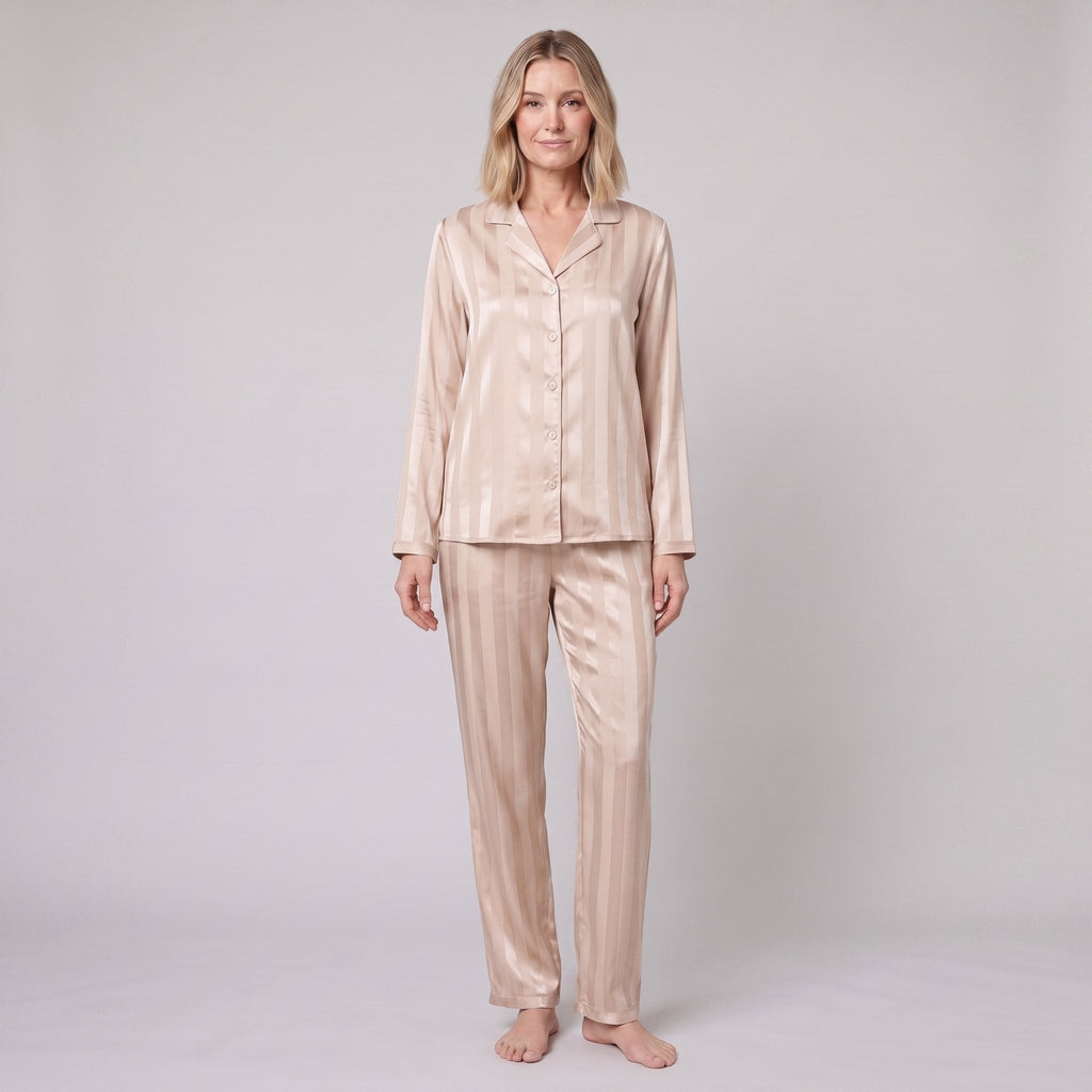 Luxe satin pyjama set in champagne beige, relaxed front pose on model