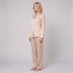 Luxe satin pyjama set in champagne beige, side view on model