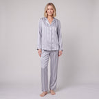 Luxe satin pyjama set in silver blue, front view on model