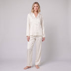 Luxe satin pyjama set in ivory white, front view on model