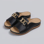 Mela slip-on slide sandals Black with gold buckle