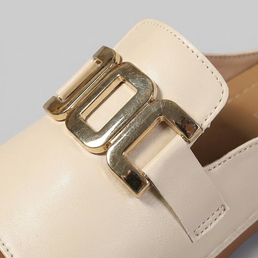 Mela sandals gold buckle and sole detail
