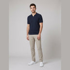 Milo dark navy textured knit V-neck polo shirt on male model