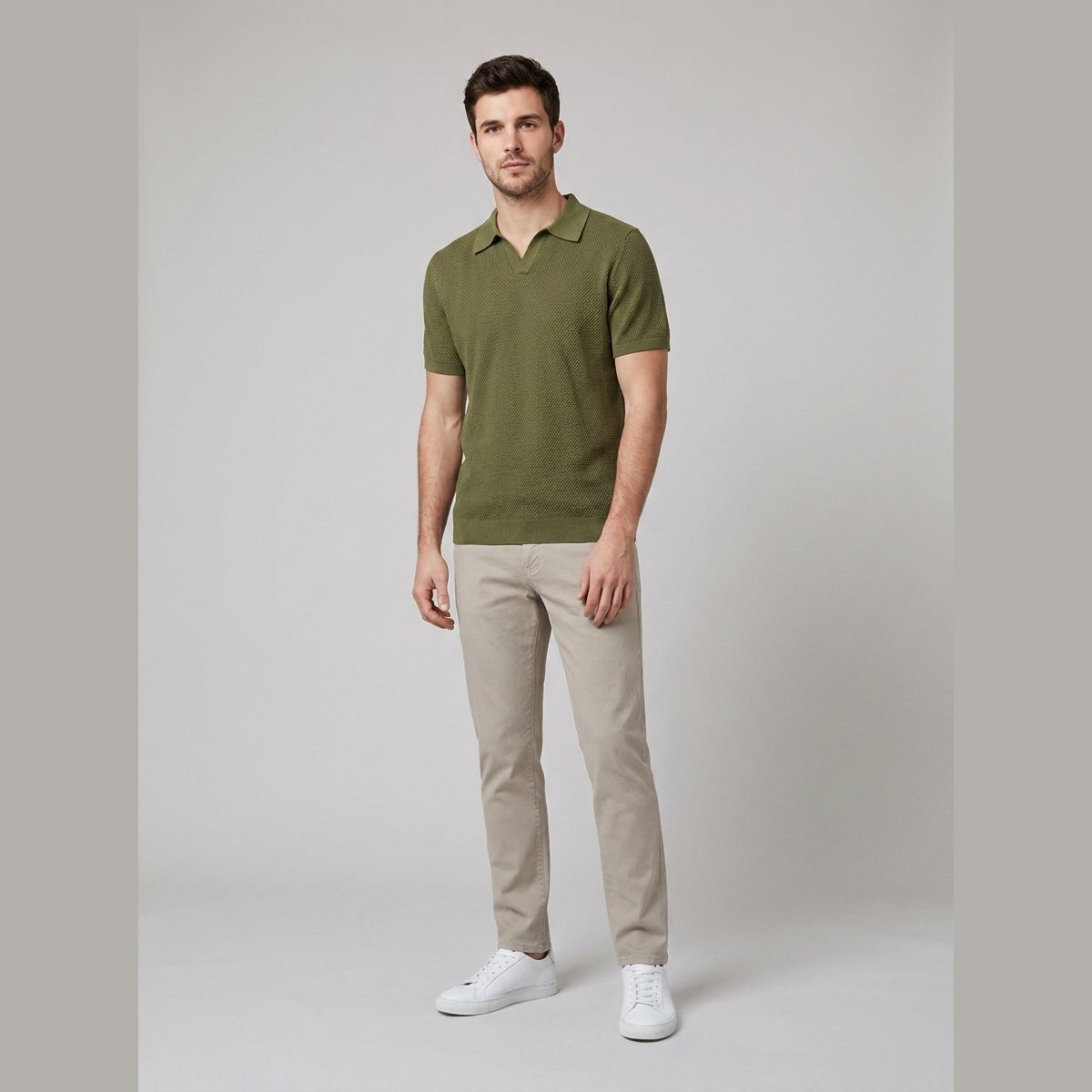 Milo olive green textured knit V-neck polo shirt on male model