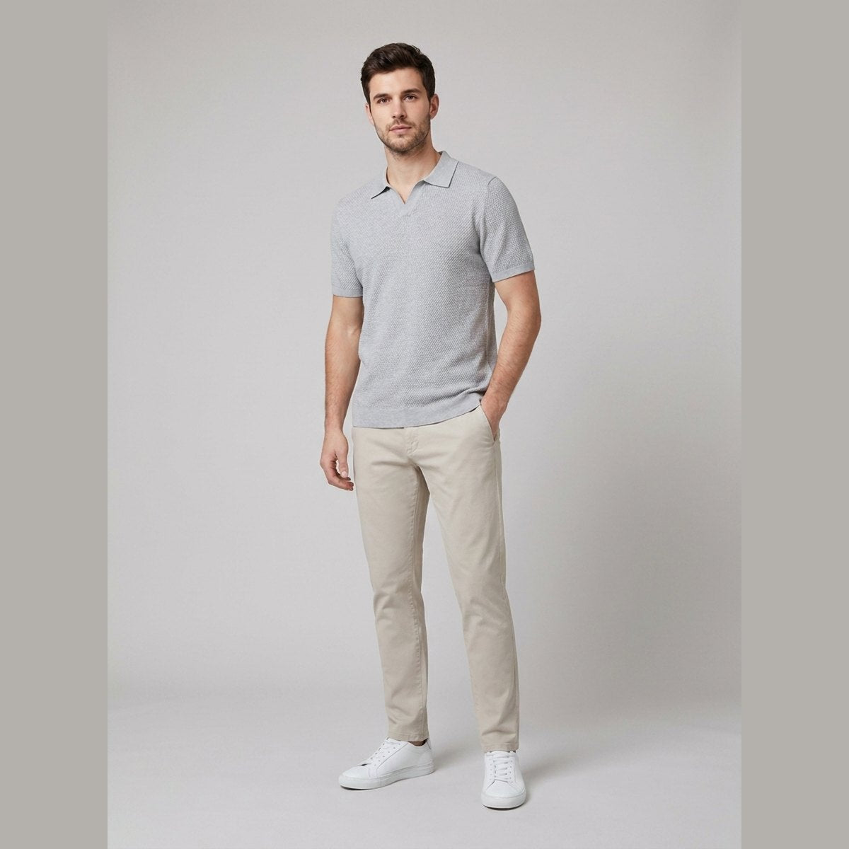 Milo grey textured knit V-neck polo shirt on male model