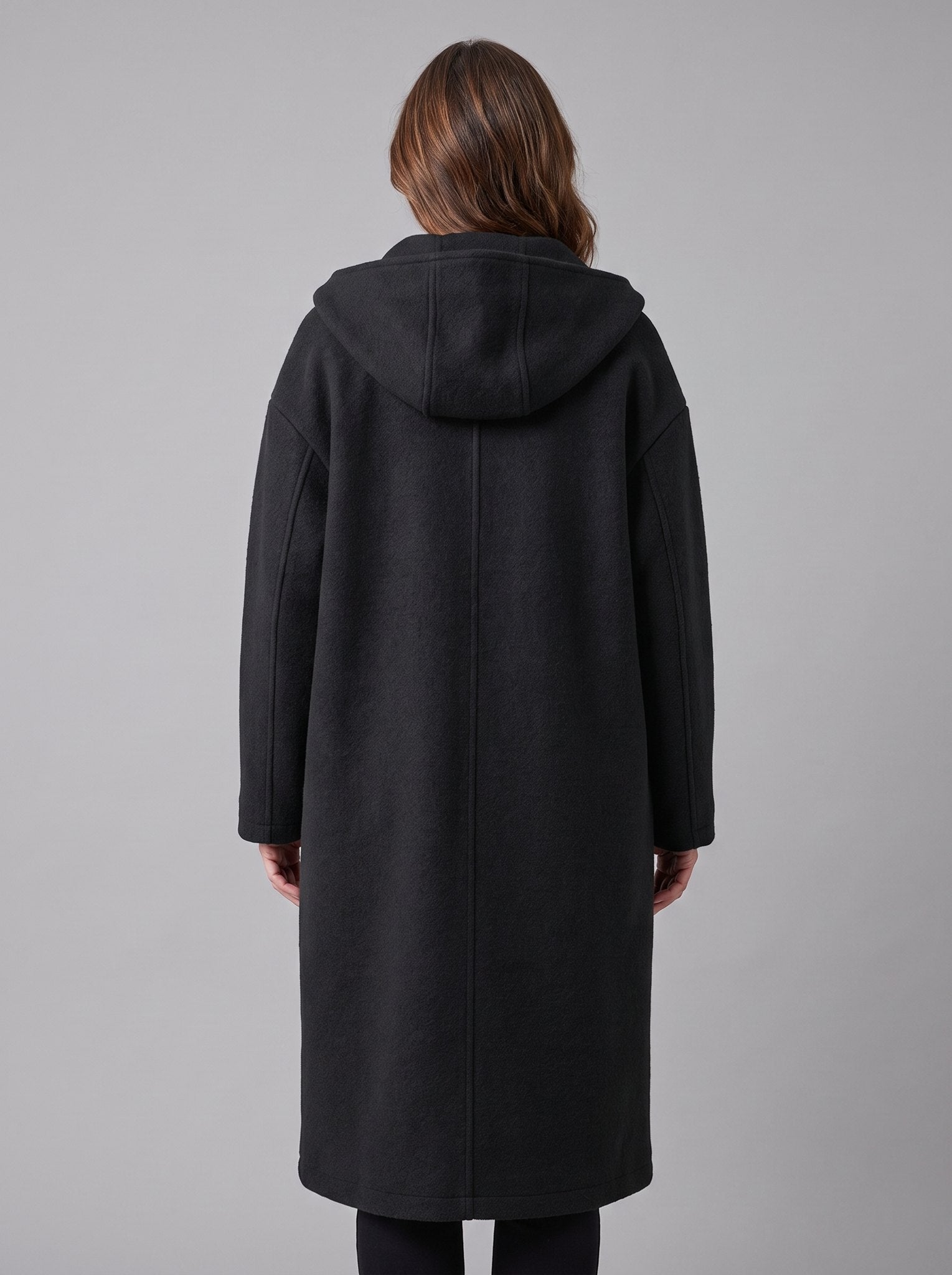 Nordin lightweight hooded wool coat in black, back view on model