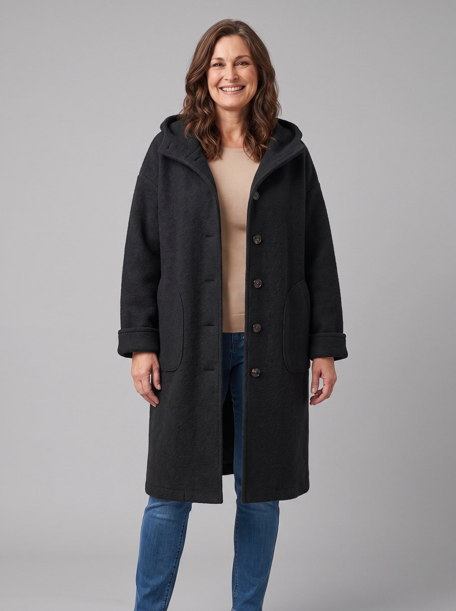 Nordin lightweight hooded wool coat in black, front view on model