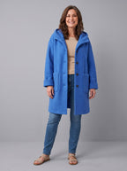 Nordin lightweight hooded wool coat in royal blue, front view on model
