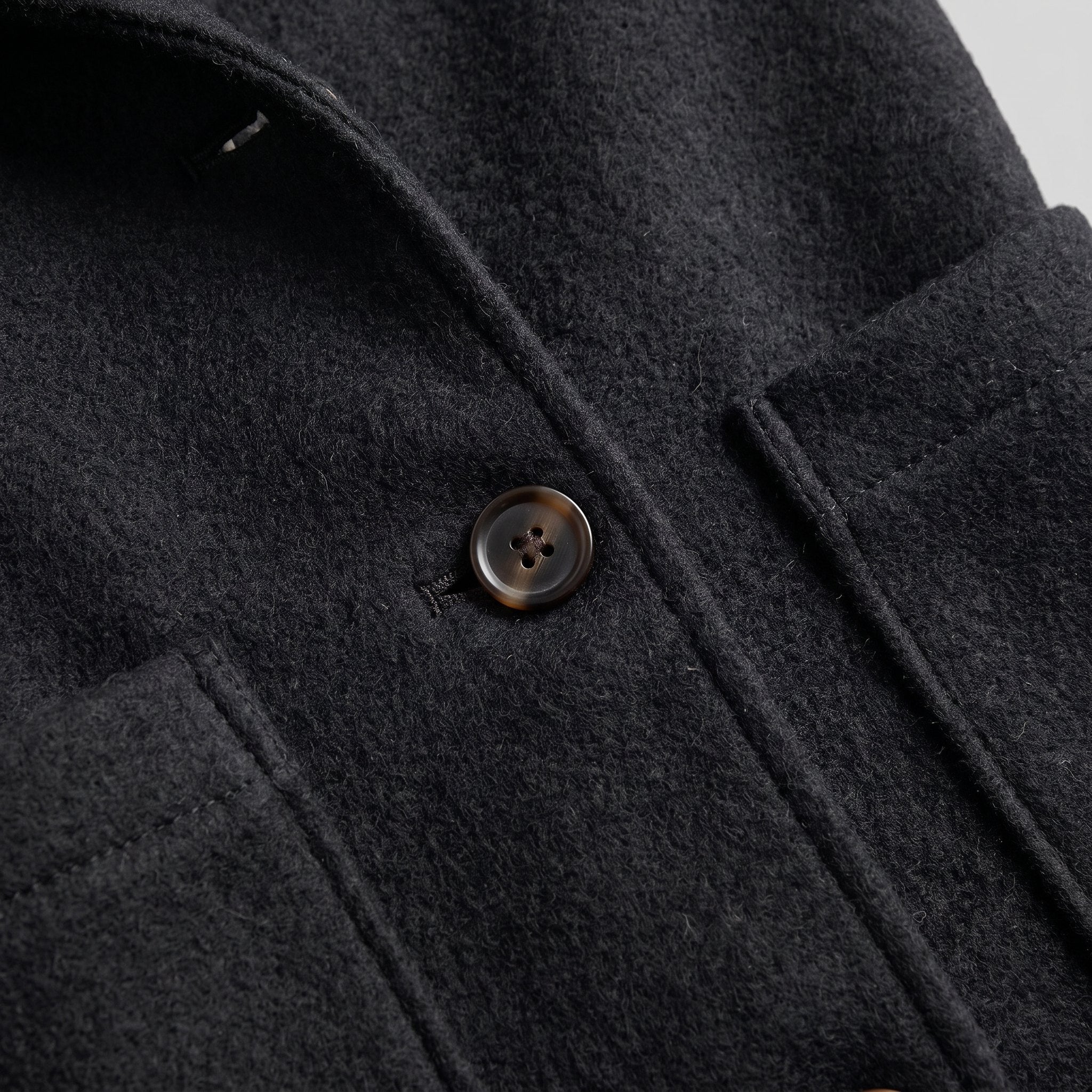 Nordin lightweight hooded wool coat, wool fabric and button detail