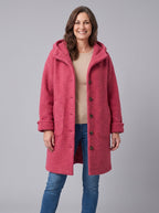 Nordin lightweight hooded wool coat in raspberry pink, front view on model