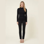 Ravishing black ruched jersey long sleeve top on model