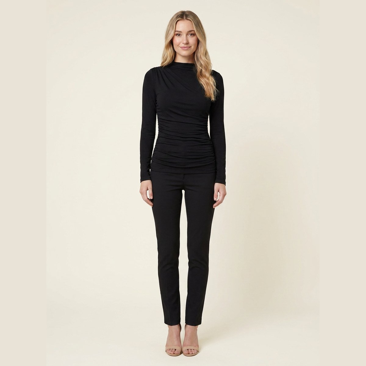 Ravishing black ruched jersey long sleeve top on model