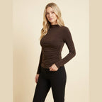 Ravishing dark brown ruched jersey long sleeve top on model