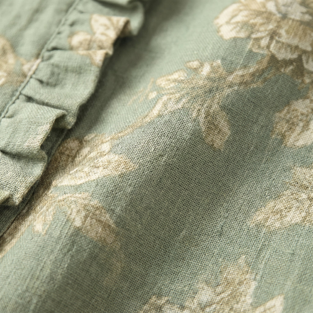 Rosalinde sage-green linen fabric close-up
