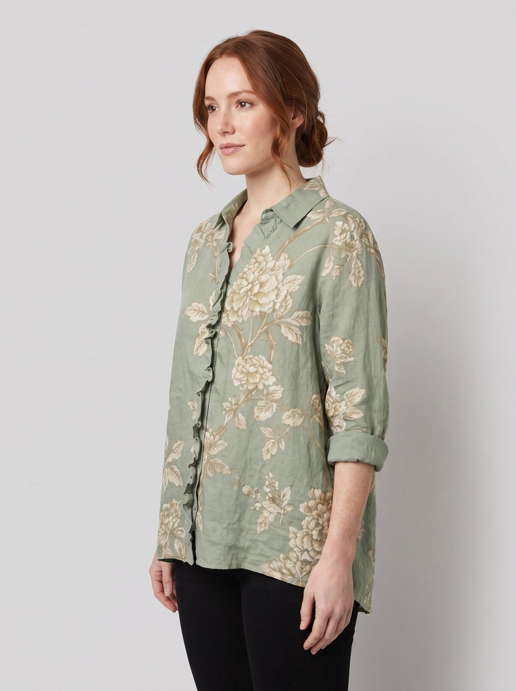Rosalinde sage-green linen blouse side pose
