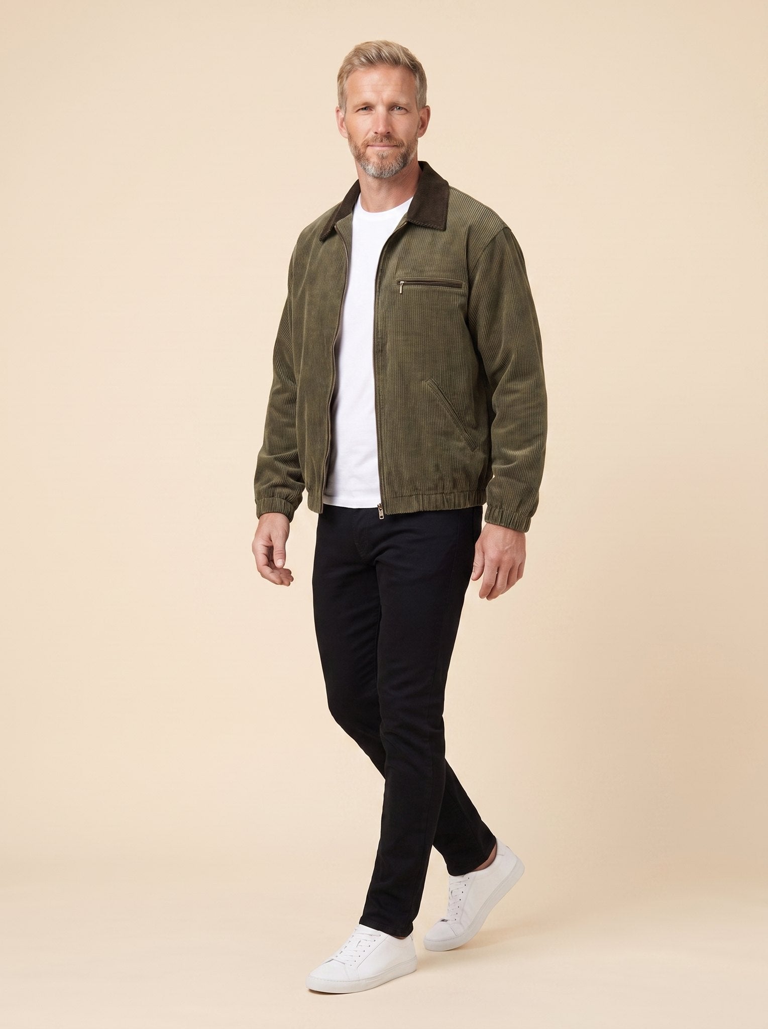 Salvador corduroy zip jacket green on model walking