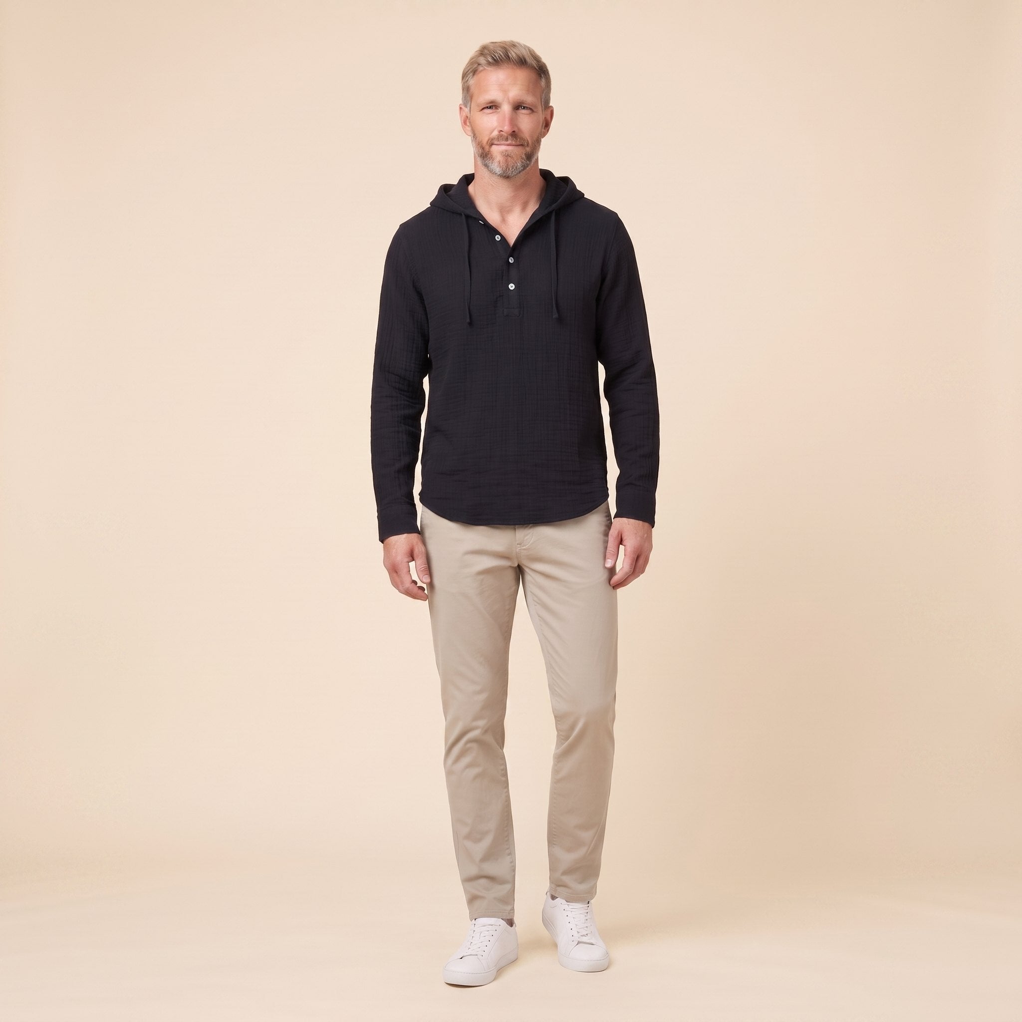 Seven linen hooded henley shirt in black, front view on model