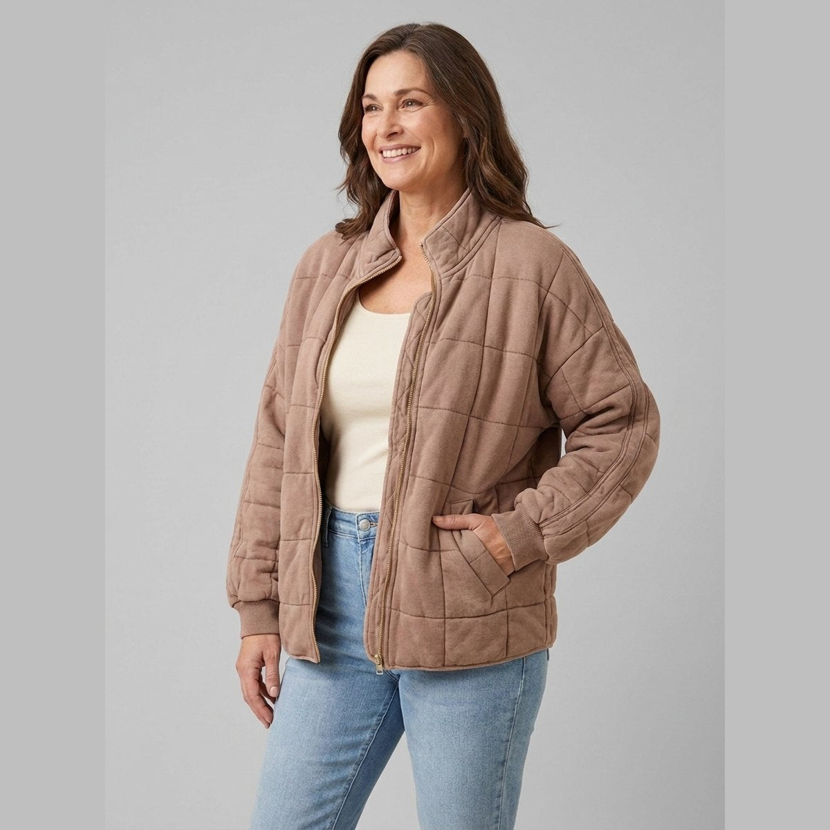 Timber oversized quilted jacket in beige on model