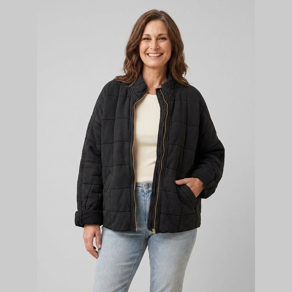 Timber oversized quilted jacket in black on model
