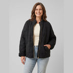 Timber oversized quilted jacket in black on model