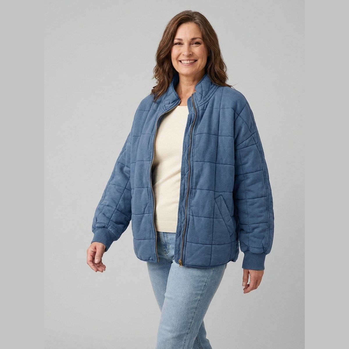 Timber oversized quilted jacket in denim blue on model